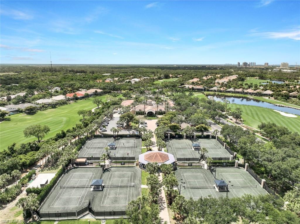 19081 Ridgepoint Drive, Unit 201 Estero, FL 33928 - Photo 49 of 50 an aerial view of residential houses with outdoor space