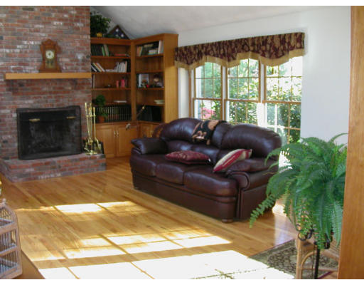 31 B Hunters Road Boxford, MA 01921 - Photo 2 of 11 a living room with furniture and a fireplace