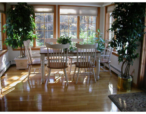 31 B Hunters Road Boxford, MA 01921 - Photo 3 of 11 a living room with furniture and a floor to ceiling window