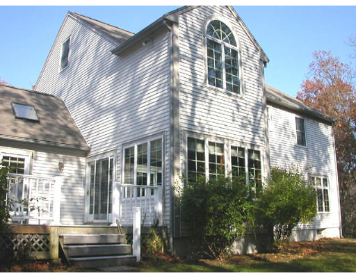 31 B Hunters Road Boxford, MA 01921 - Photo 6 of 11 a front view of a house with a yard