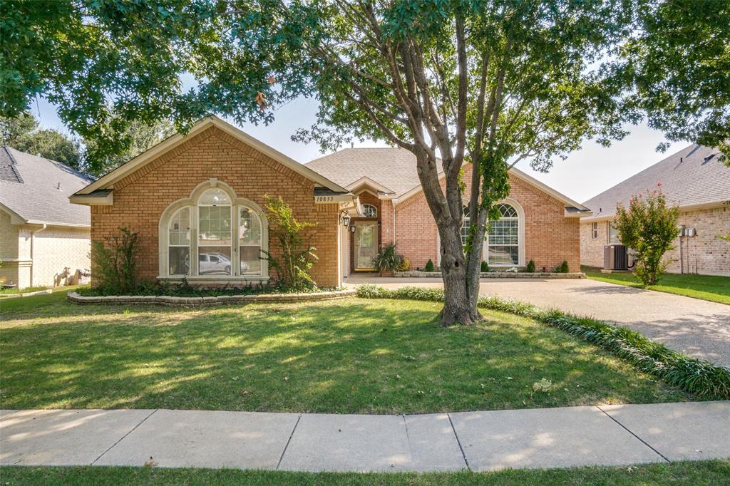 10833 Whitestone Ranch Road Fort Worth, TX 76126 - Photo 1 of 1 a front view of a house with garden