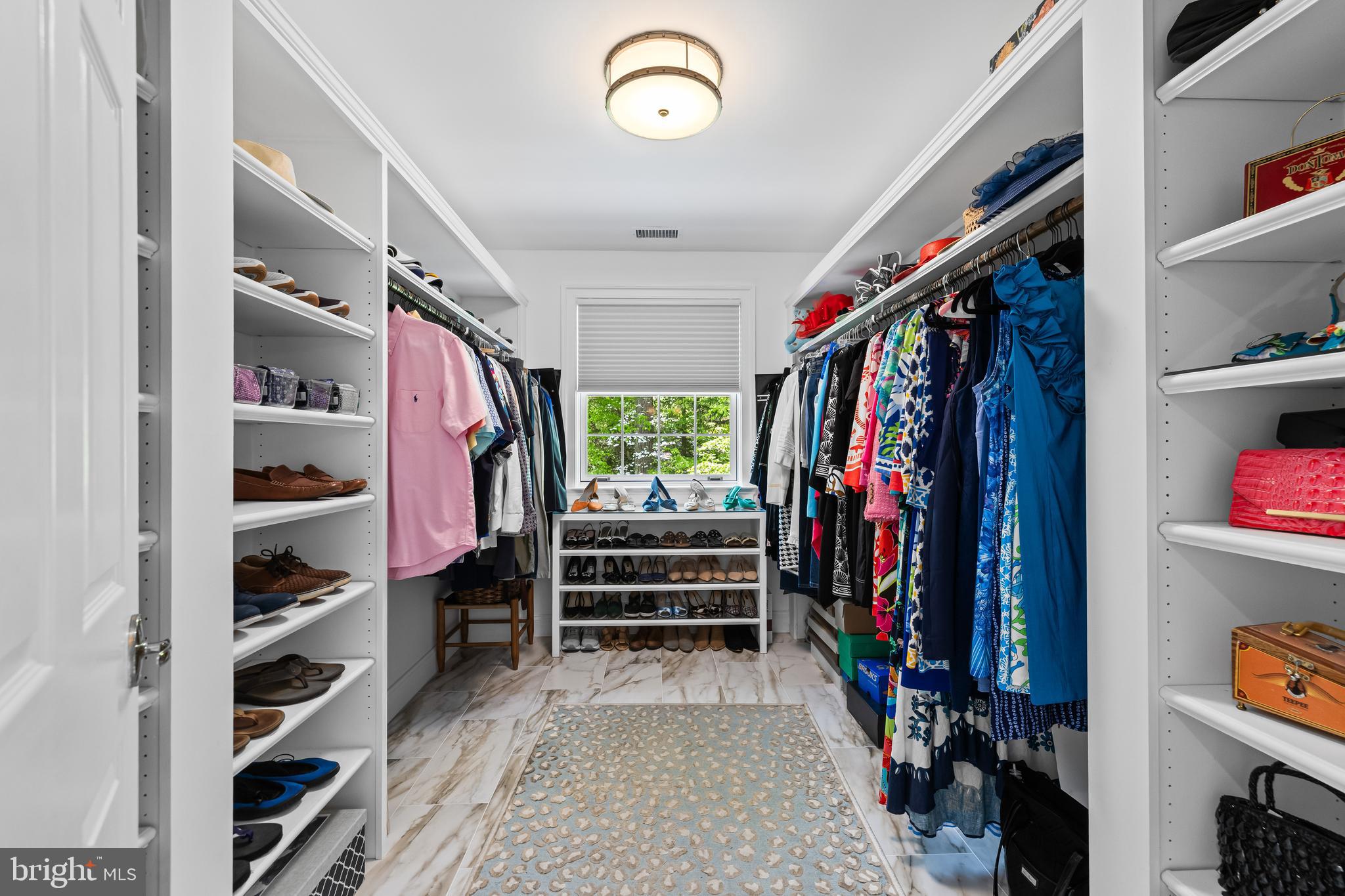 2428 Old Bosley Road Cockeysville, MD 21030 - Photo 32 of 53 a view of walk in closet with clothes and shoes