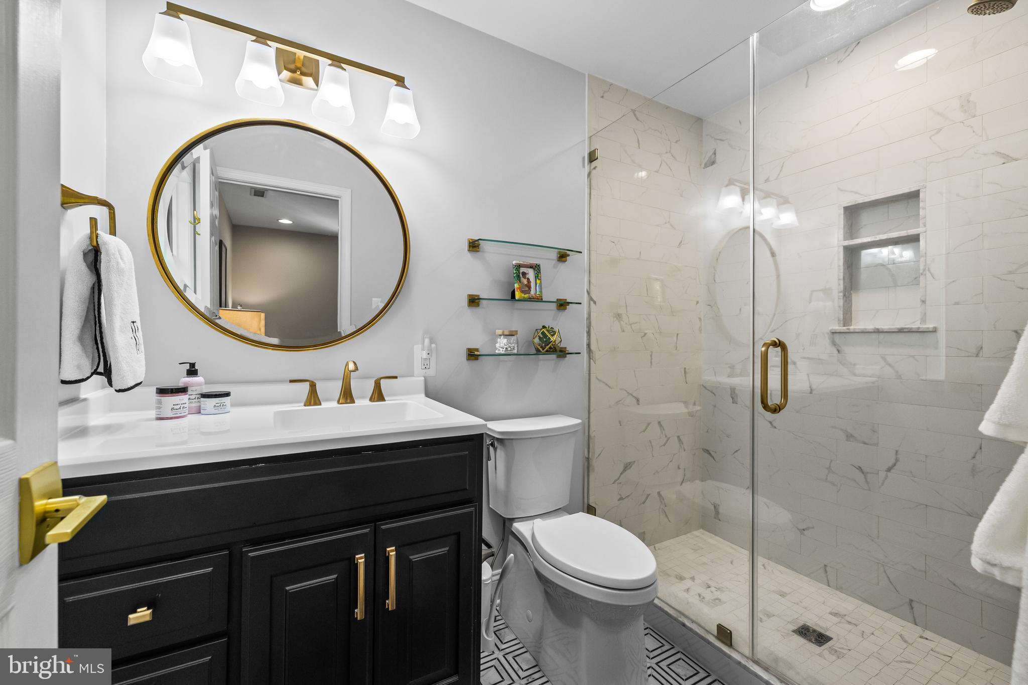 2428 Old Bosley Road Cockeysville, MD 21030 - Photo 36 of 53 a bathroom with a sink a toilet and a mirror