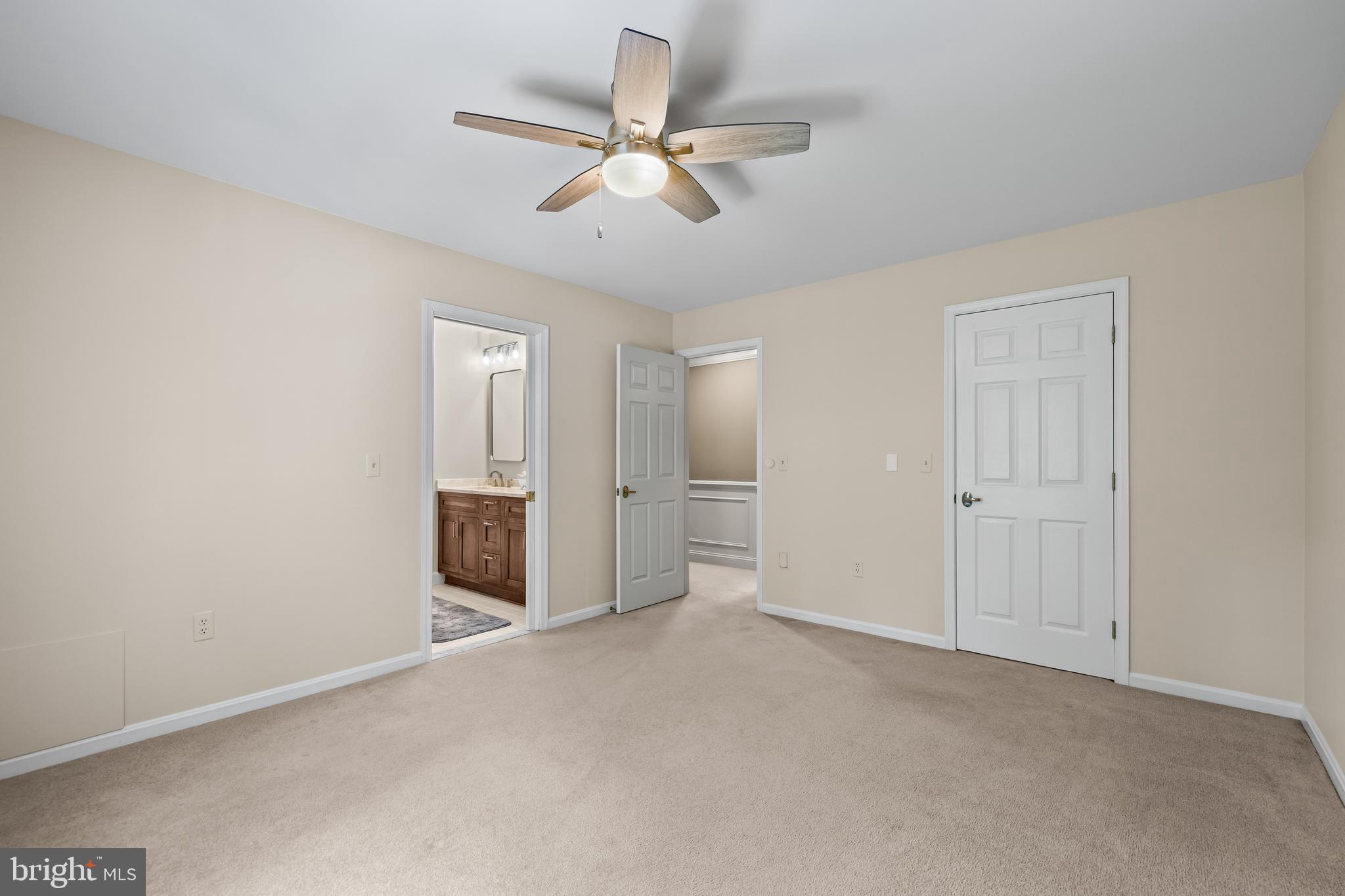 2428 Old Bosley Road Cockeysville, MD 21030 - Photo 39 of 53 wooden floor in an empty room and a ceiling fan