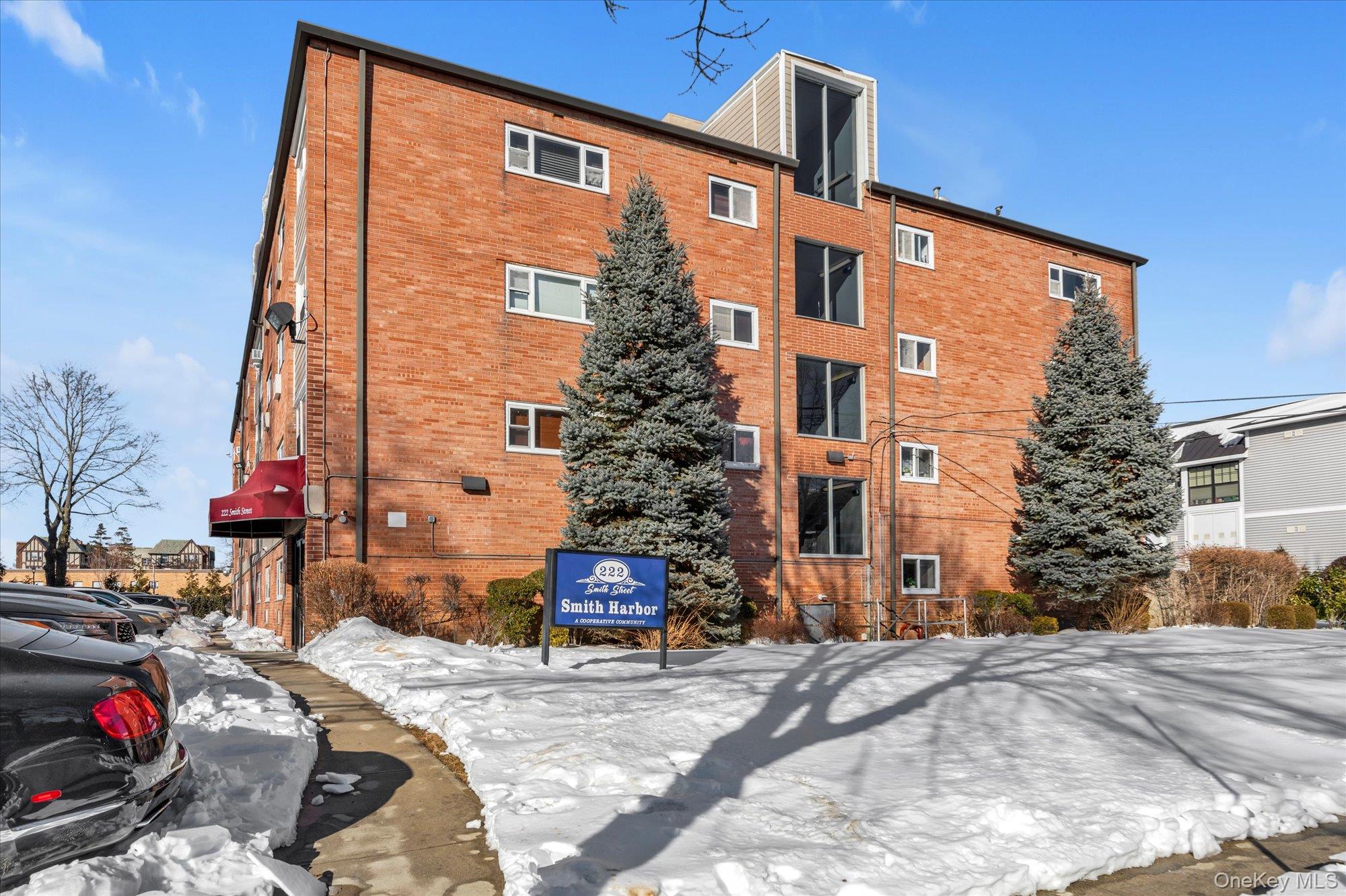 222 Smith Street, Unit 4F Freeport, NY 11520 - Photo 15 of 16 a front view of a building