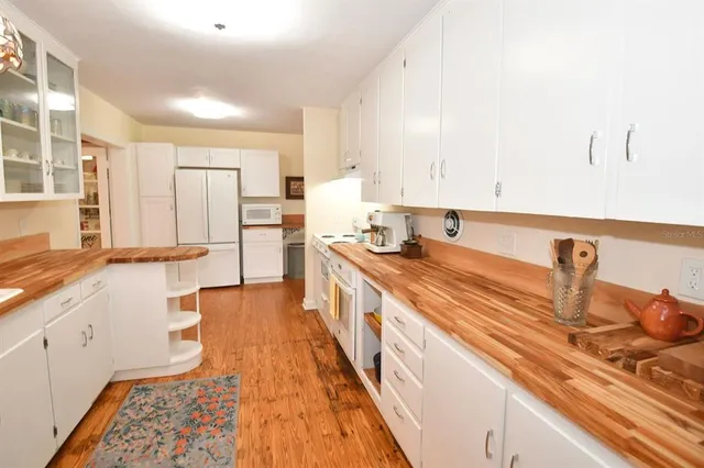 a view of a lake with a yard