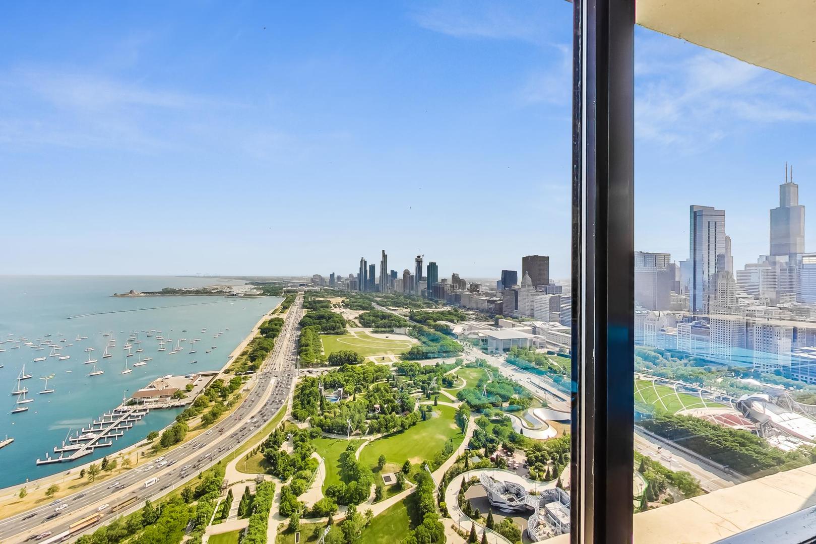 360 East Randolph Street, Unit 1007 Chicago, IL 60601 - Photo 20 of 28 a view of a city from a balcony