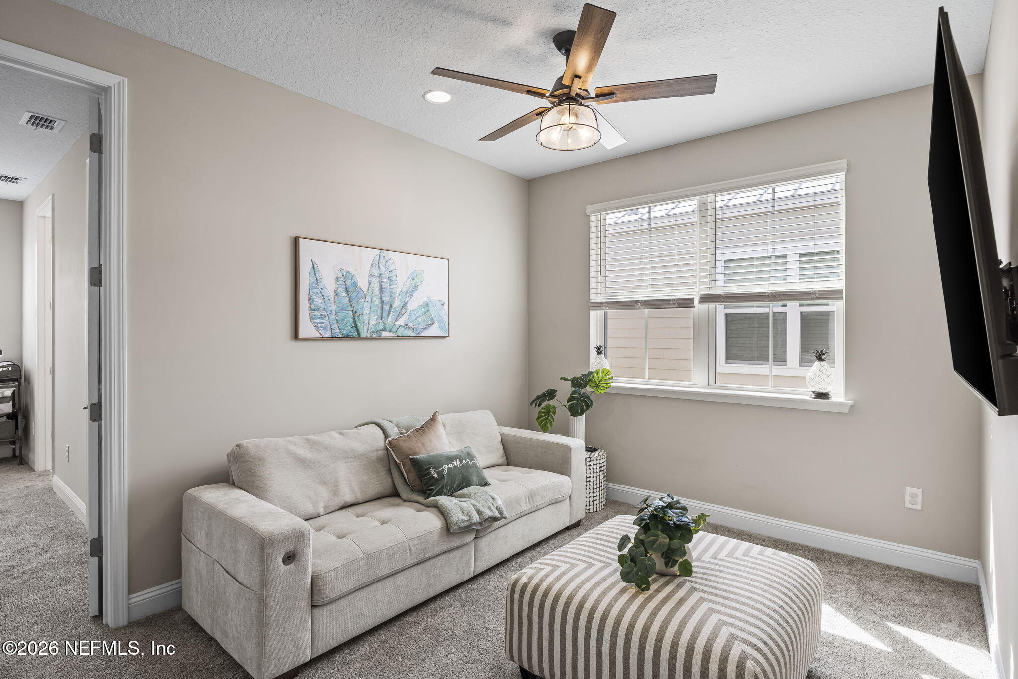 385 Rum Runner Way St. Johns, FL 32259 - Photo 13 of 35 a living room with furniture and a window