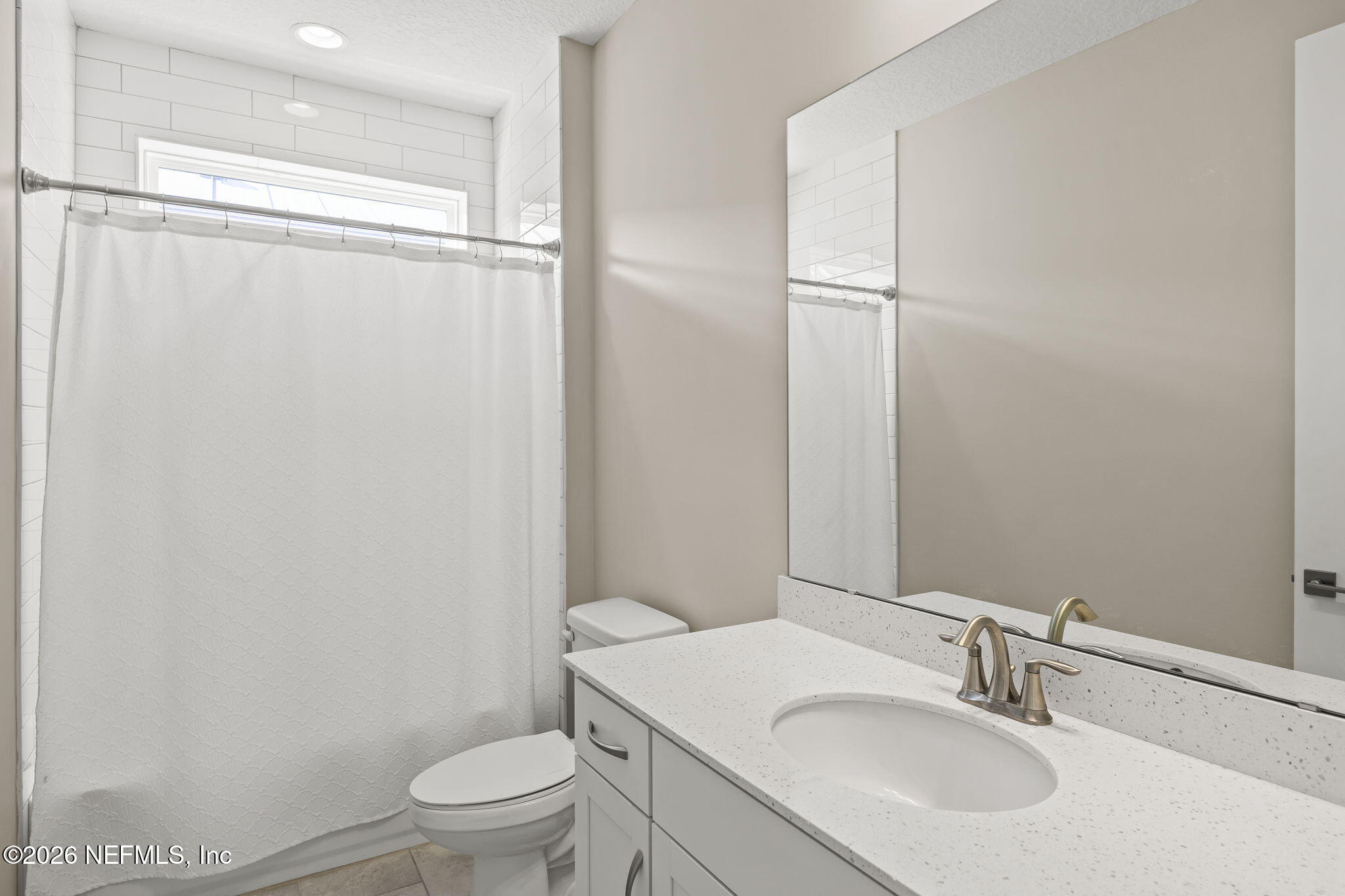 385 Rum Runner Way St. Johns, FL 32259 - Photo 21 of 35 a bathroom with a sink toilet and shower