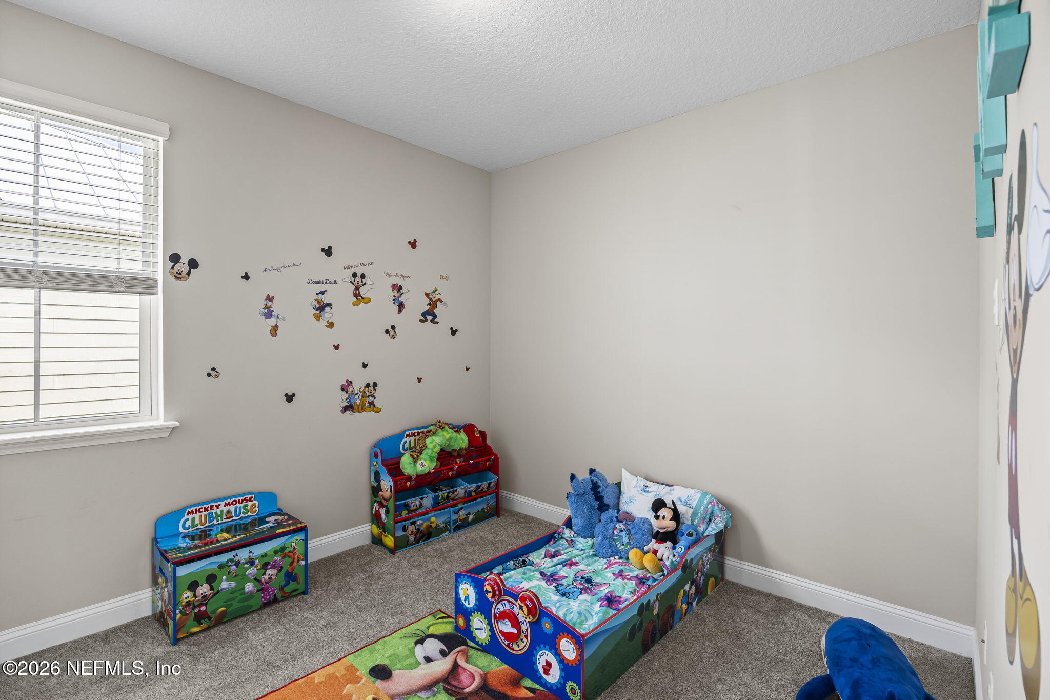 385 Rum Runner Way St. Johns, FL 32259 - Photo 22 of 35 a room with toys and a wooden floor