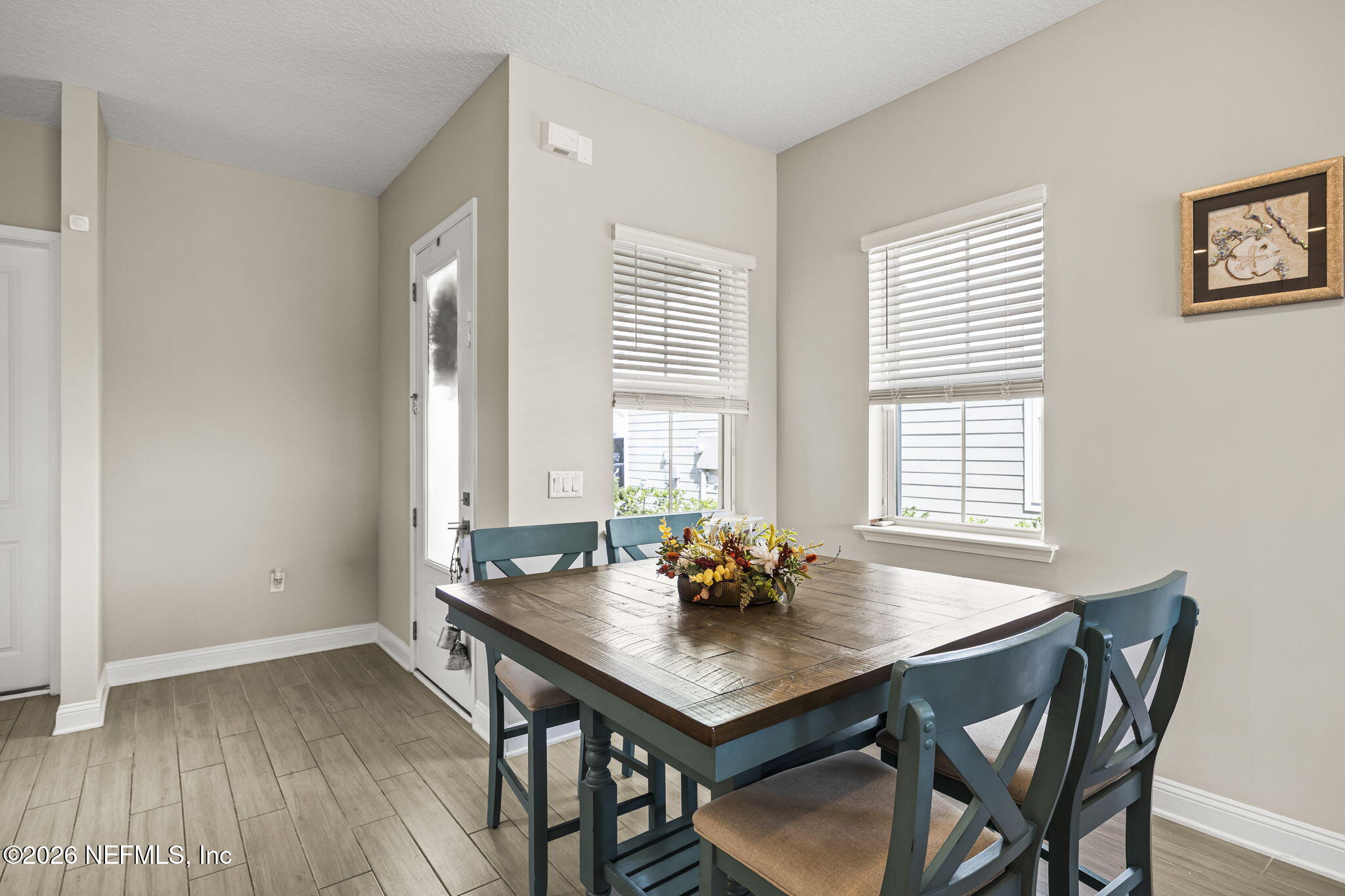 385 Rum Runner Way St. Johns, FL 32259 - Photo 7 of 35 a view of a dining room with furniture and window