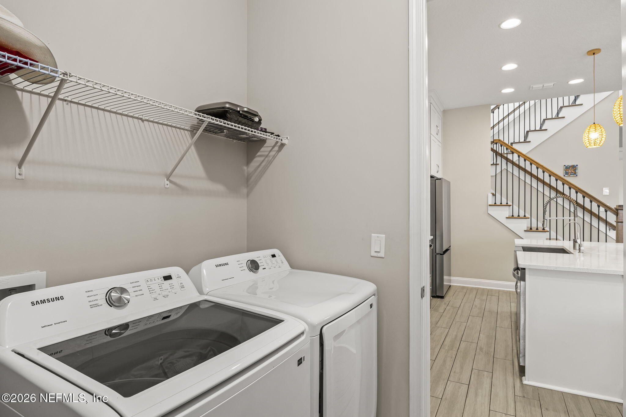385 Rum Runner Way St. Johns, FL 32259 - Photo 8 of 35 a utility room with dryer and washer