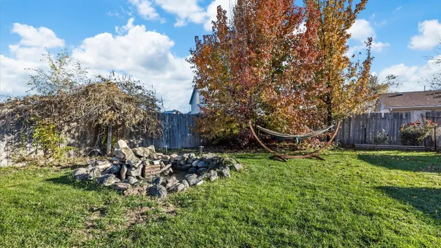 a backyard of a house with lots of green space