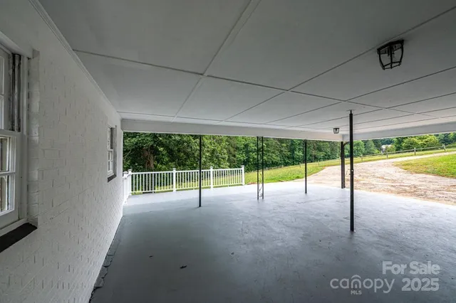 a view of an empty room with window