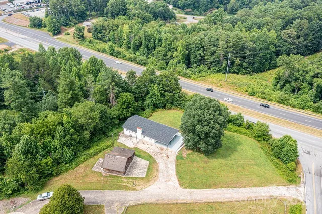 a view of a yard with a patio