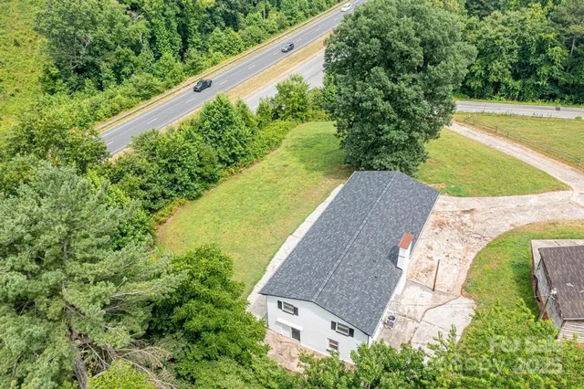 view of a house with a yard