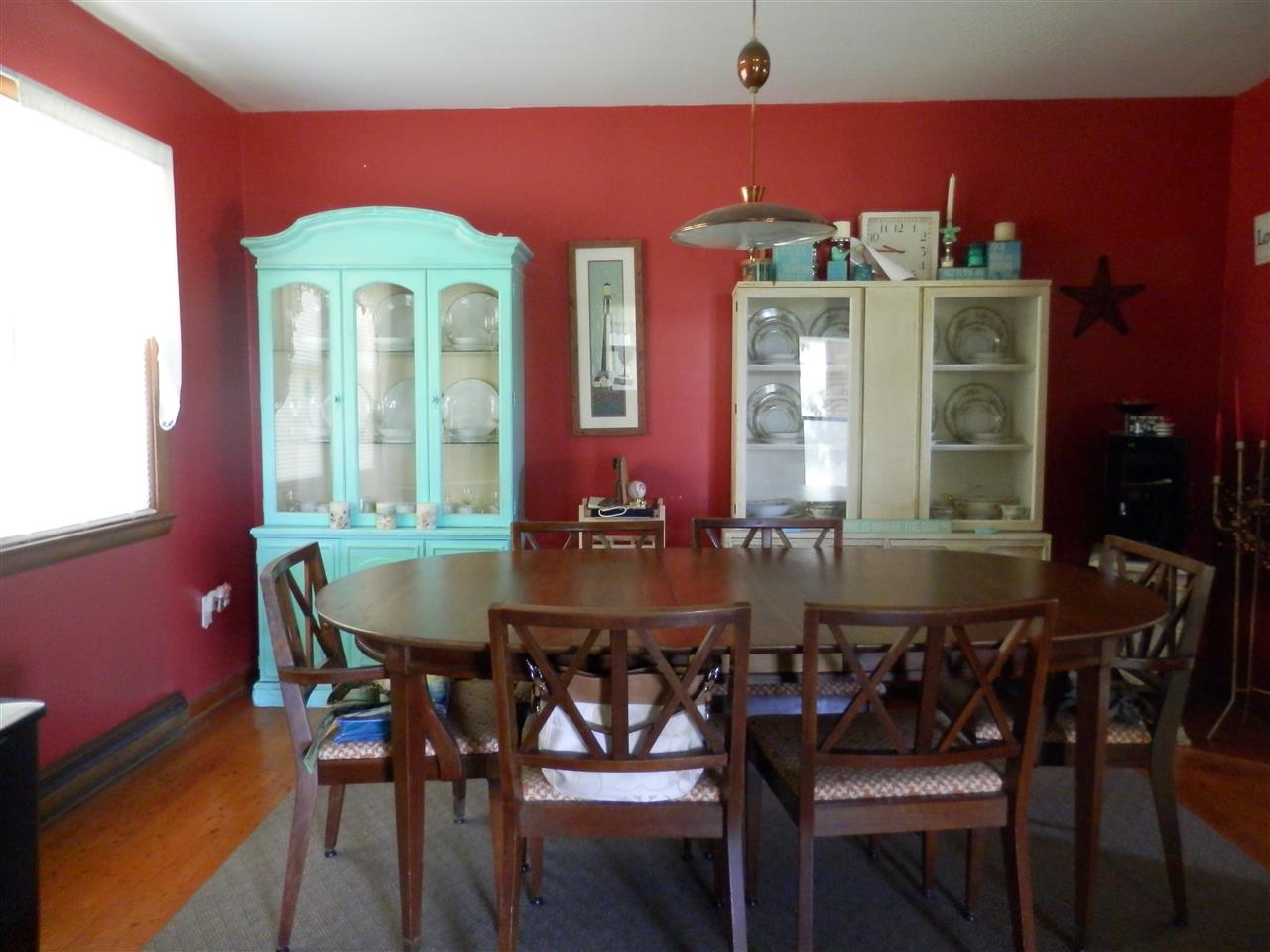 585 Rittenour Road Edinburg, VA 22824 - Photo 11 of 18 a view of a dining room with furniture and chandelier
