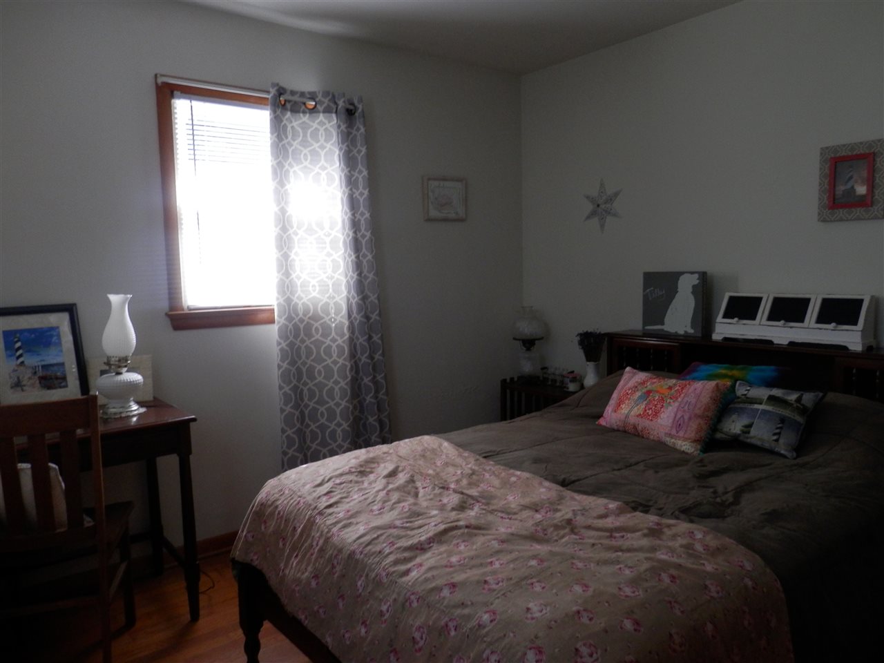 585 Rittenour Road Edinburg, VA 22824 - Photo 14 of 18 a bedroom with a bed and a window