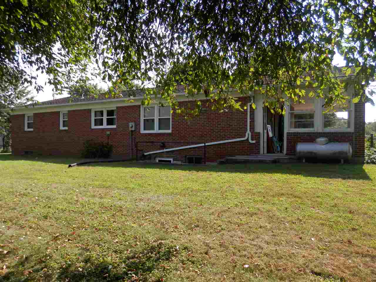 585 Rittenour Road Edinburg, VA 22824 - Photo 2 of 18 a front view of house with yard and trees