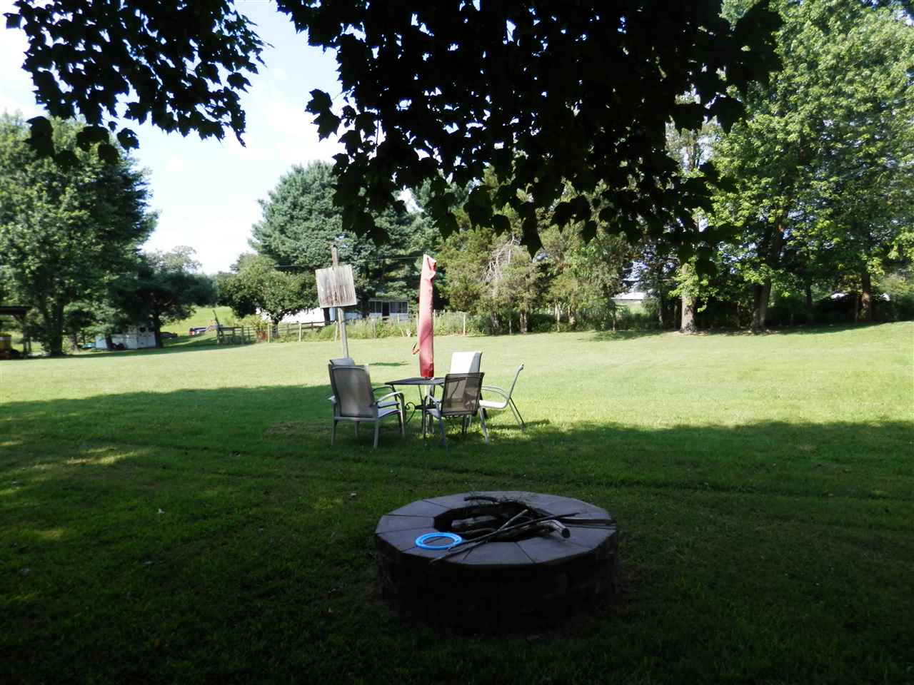 585 Rittenour Road Edinburg, VA 22824 - Photo 6 of 18 a view of a golf course with a garden