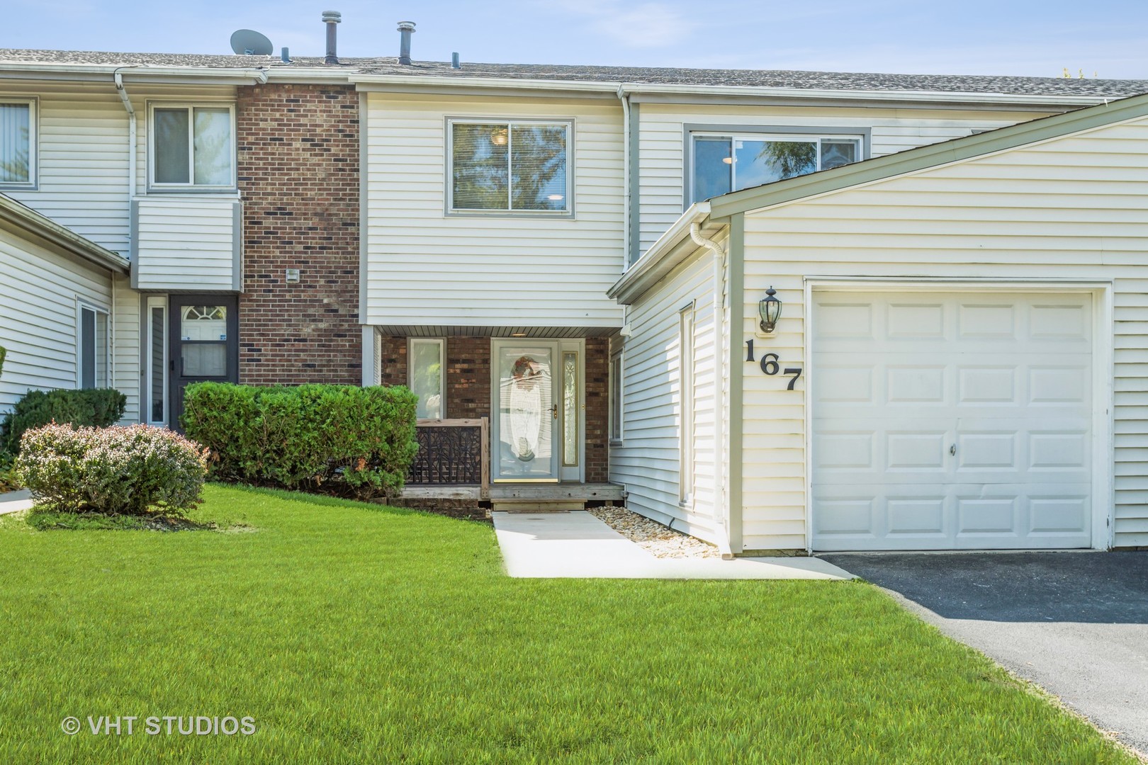167 Roberts Road Bolingbrook, IL 60440 - Photo 1 of 17 a view of a house with a backyard