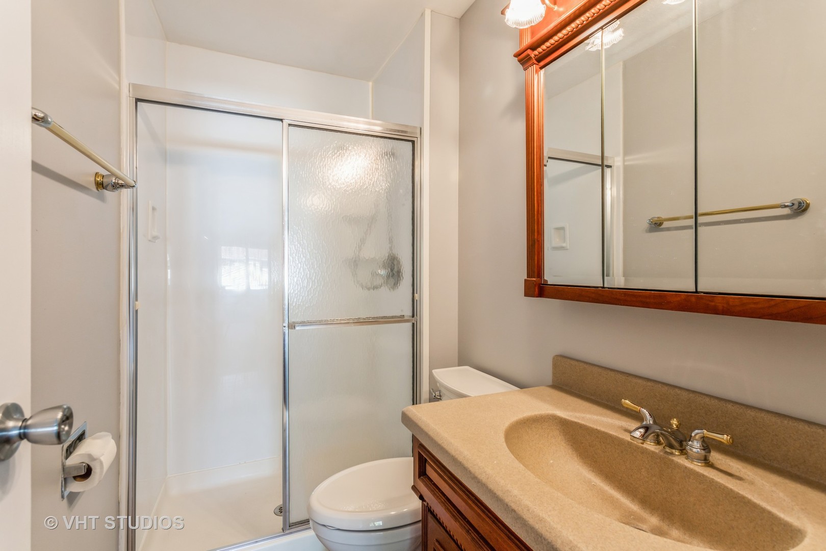 167 Roberts Road Bolingbrook, IL 60440 - Photo 11 of 17 a bathroom with a sink toilet and shower