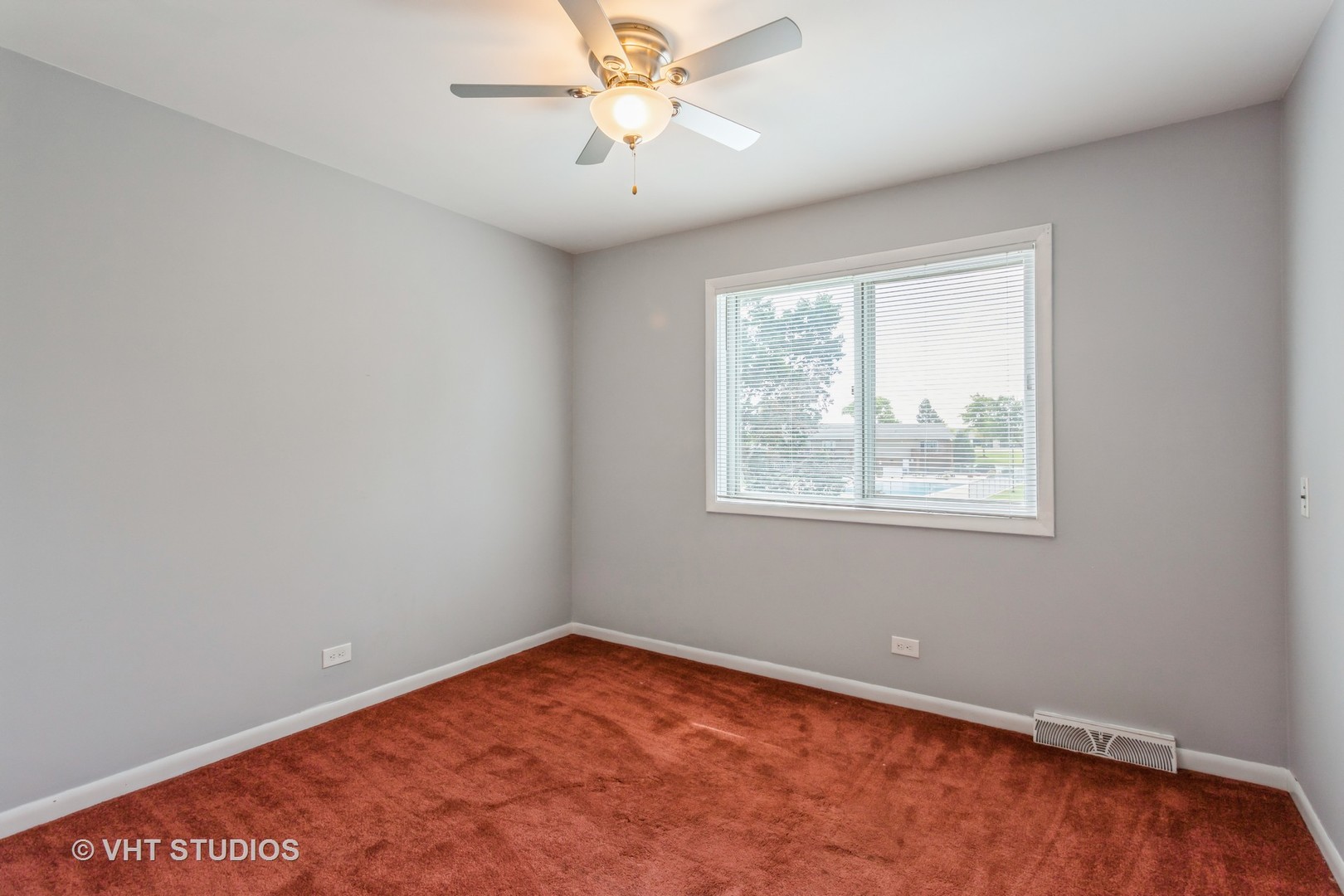 167 Roberts Road Bolingbrook, IL 60440 - Photo 14 of 17 an empty room with a window and a fan