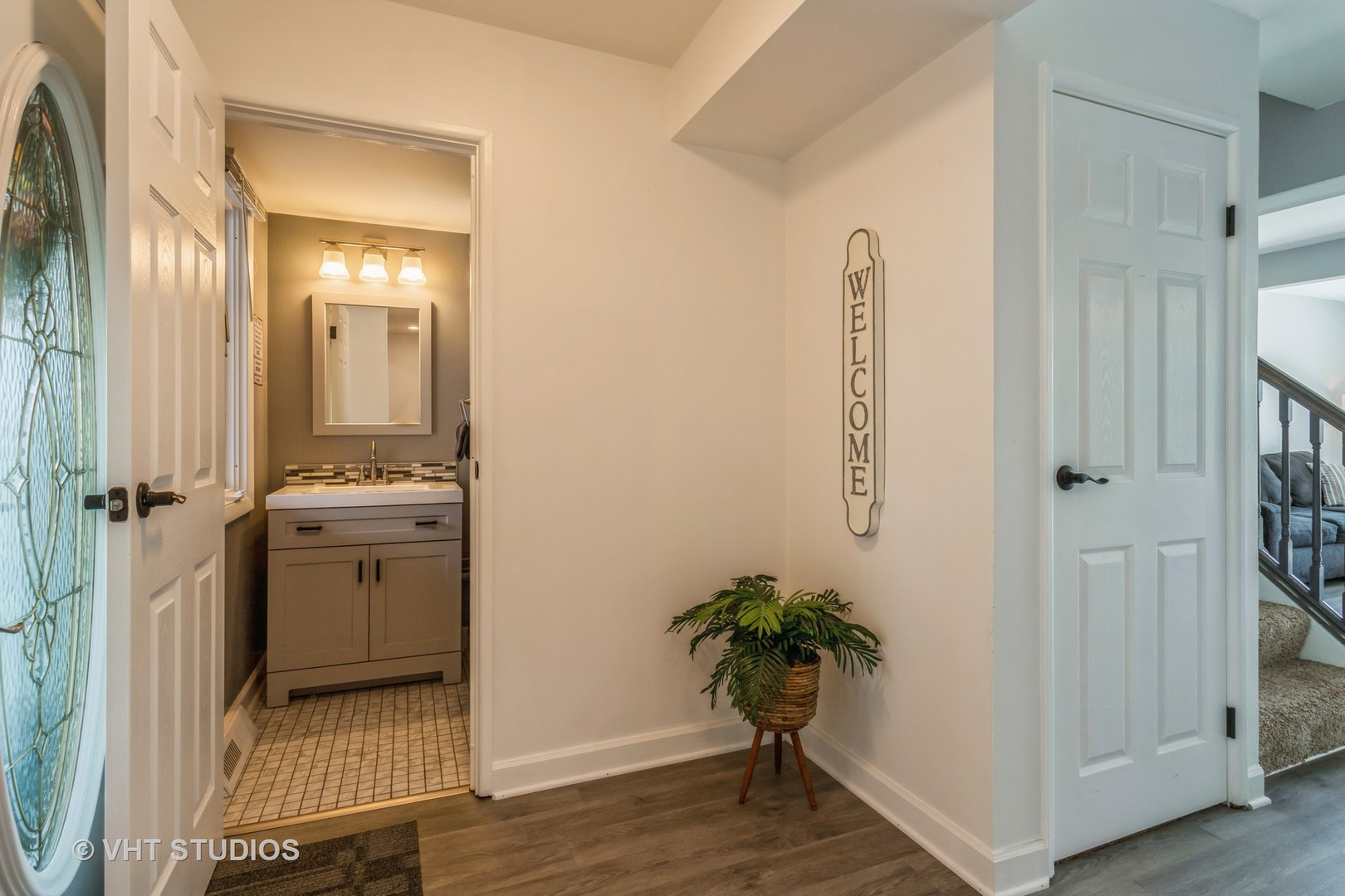 167 Roberts Road Bolingbrook, IL 60440 - Photo 2 of 17 a view of a hallway with closet and wooden floor