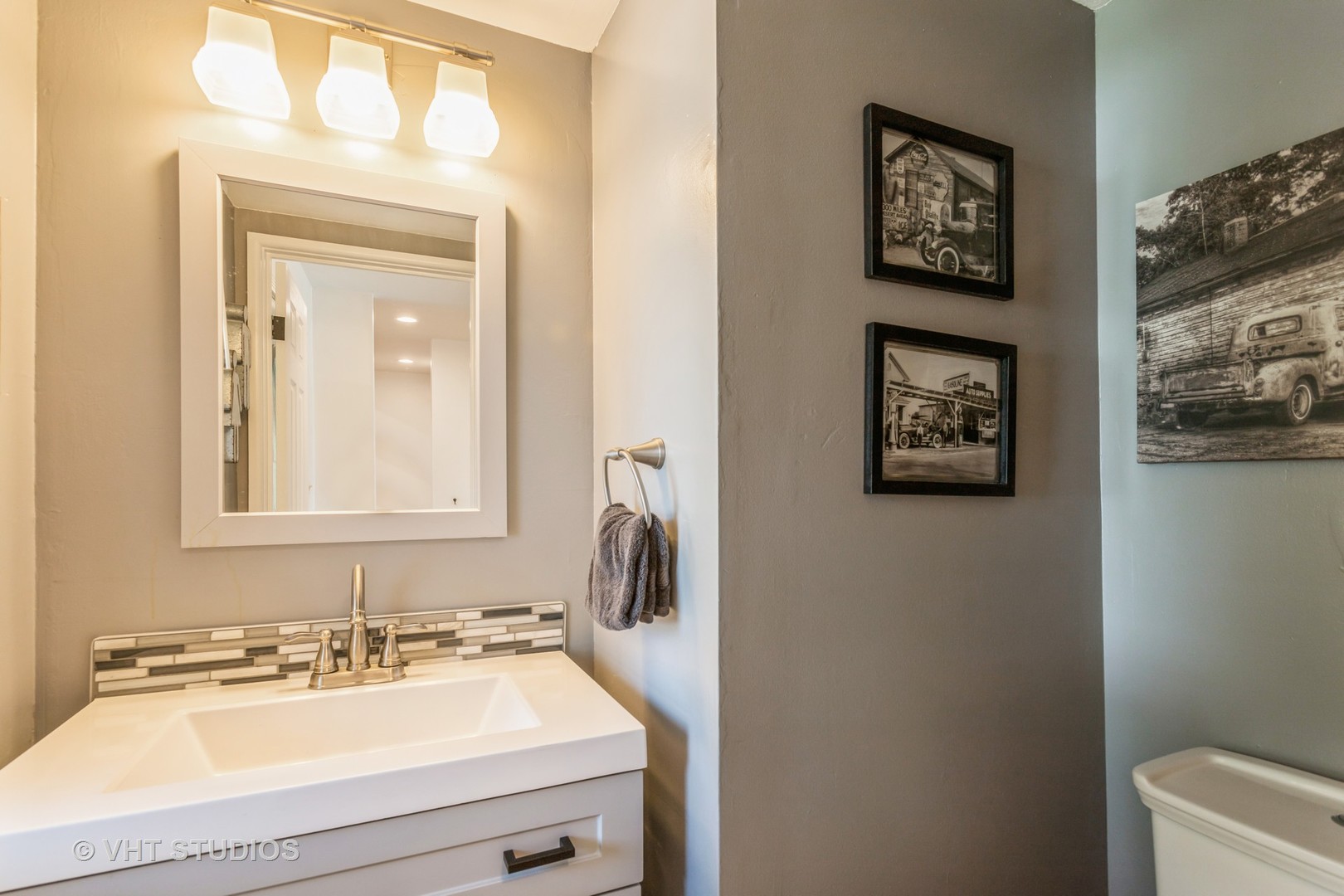 167 Roberts Road Bolingbrook, IL 60440 - Photo 9 of 17 a bathroom with a sink and a mirror