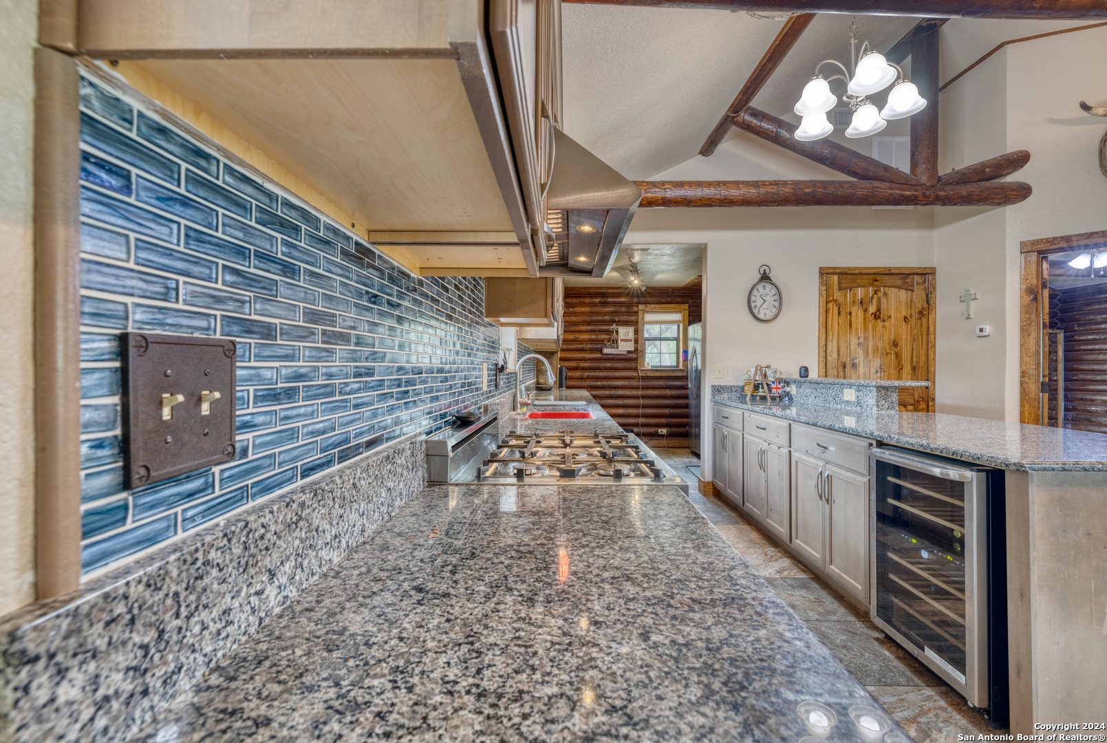 577 Mariposa Concan, TX 78838 - Photo 13 of 39 a kitchen with refrigerator and window
