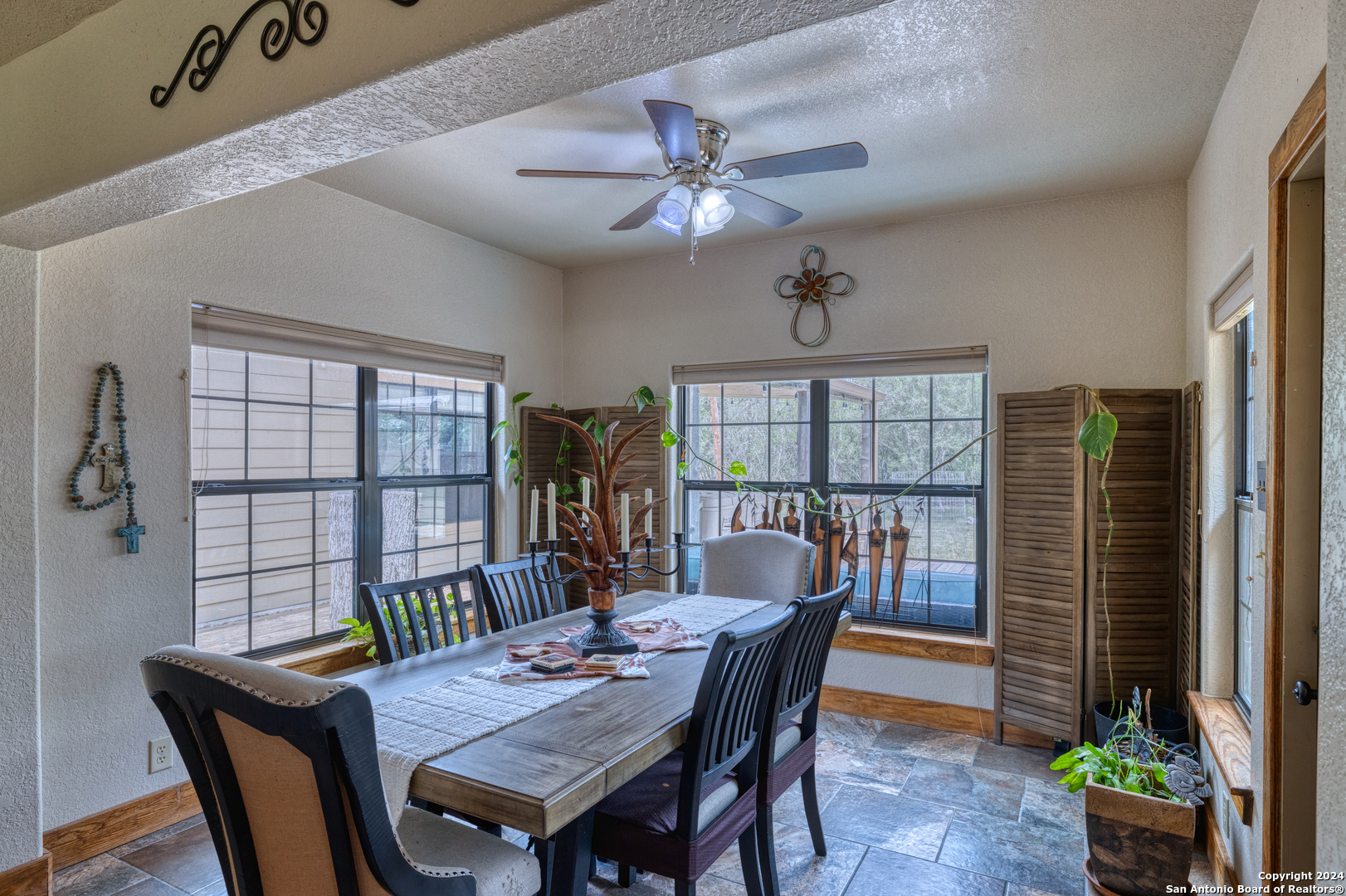 577 Mariposa Concan, TX 78838 - Photo 18 of 39 a view of a dining room with furniture window and outside view