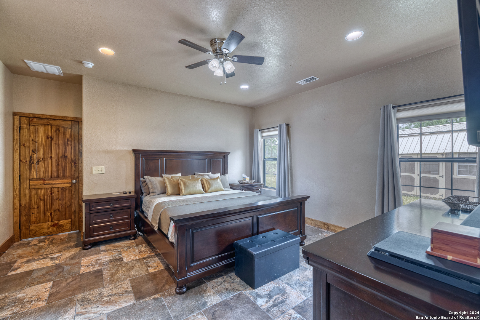 577 Mariposa Concan, TX 78838 - Photo 26 of 39 a bedroom with a bed and with furniture