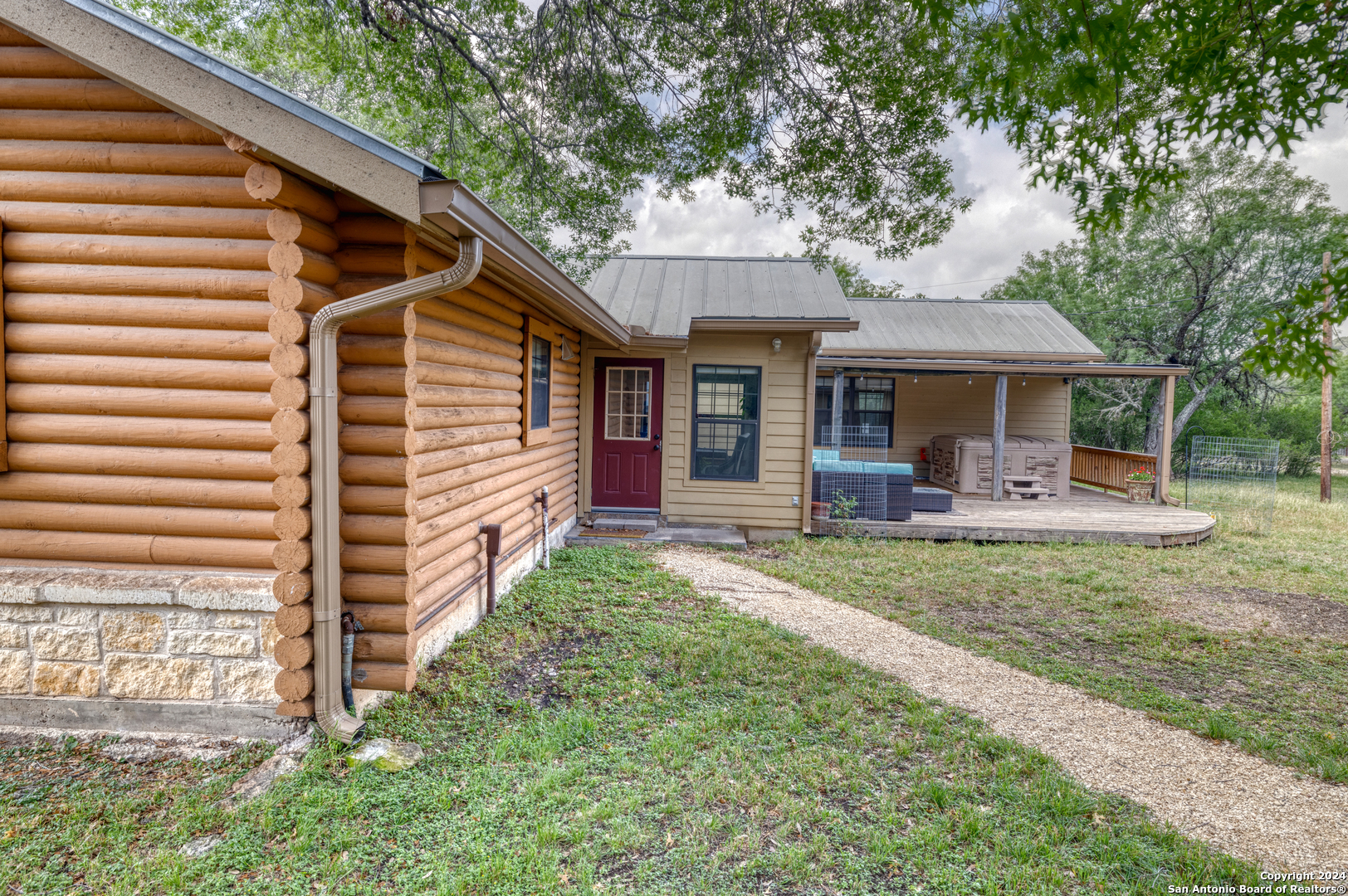 577 Mariposa Concan, TX 78838 - Photo 7 of 39 a front view of a house with a yard