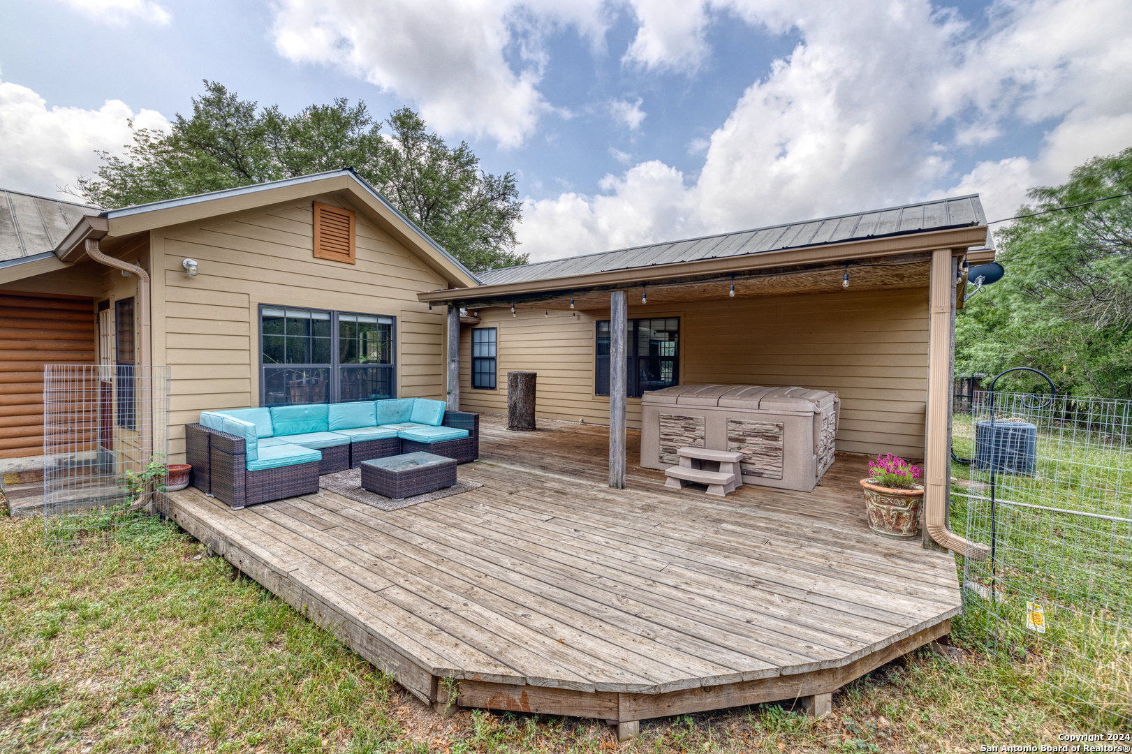 577 Mariposa Concan, TX 78838 - Photo 8 of 39 a view of a chair and table in backyard of the house