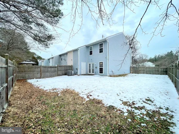 a view of a backyard of the house