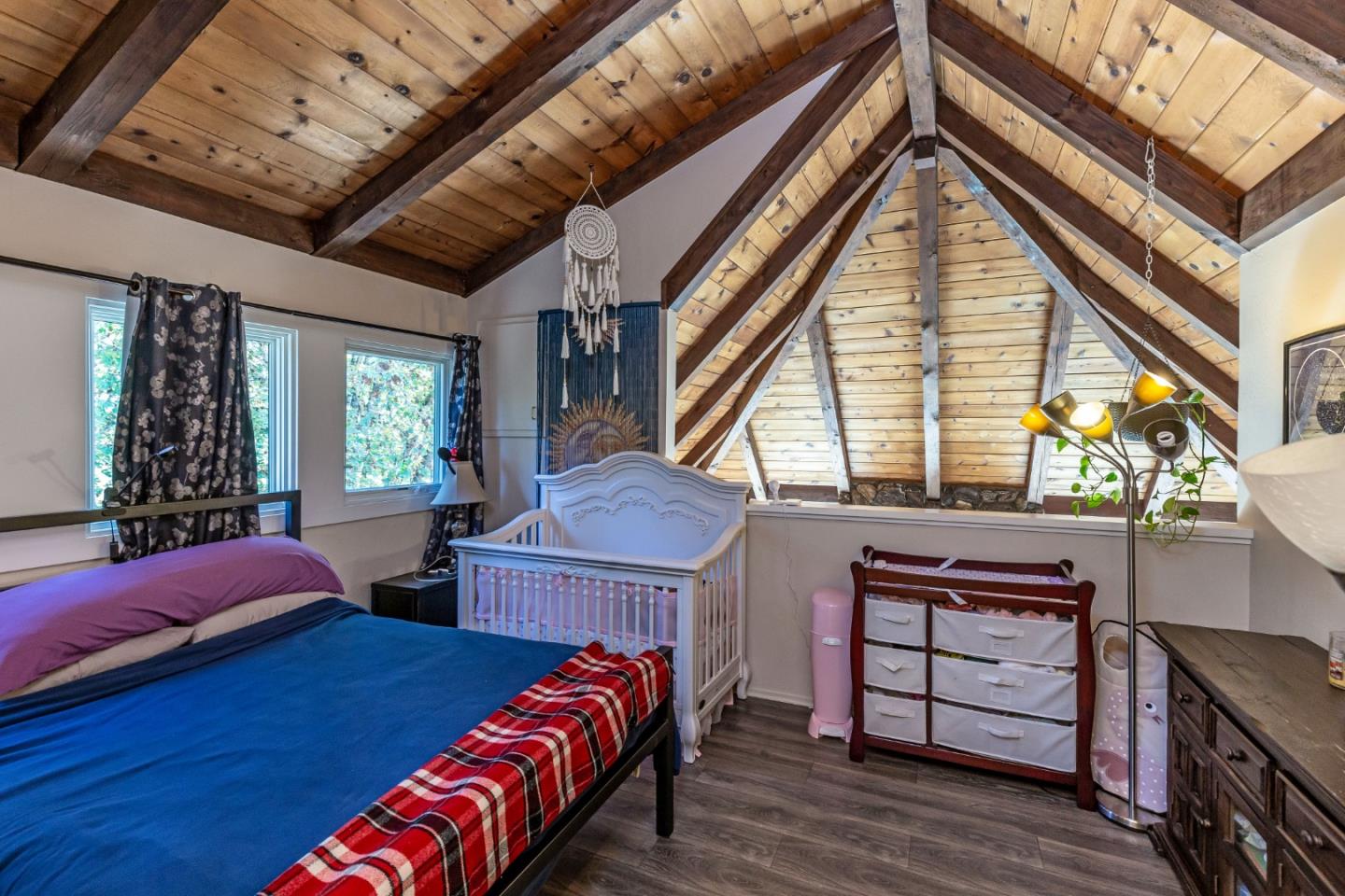 25255 Apple Hill Road Los Gatos, CA 95033 - Photo 14 of 47 a bed room with a bed and a window
