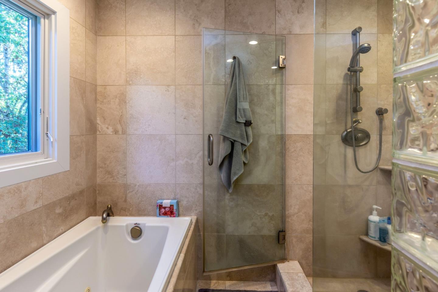 25255 Apple Hill Road Los Gatos, CA 95033 - Photo 17 of 47 a bathroom with a sink and shower