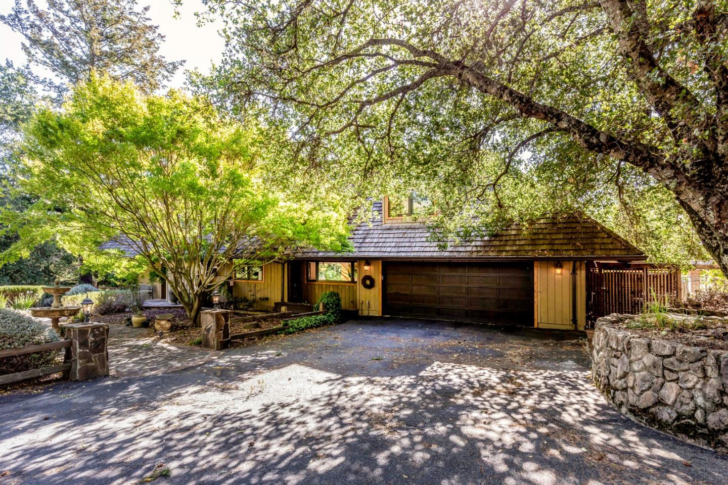 25255 Apple Hill Road Los Gatos, CA 95033 - Photo 4 of 47 a view of a house with backyard and sitting area