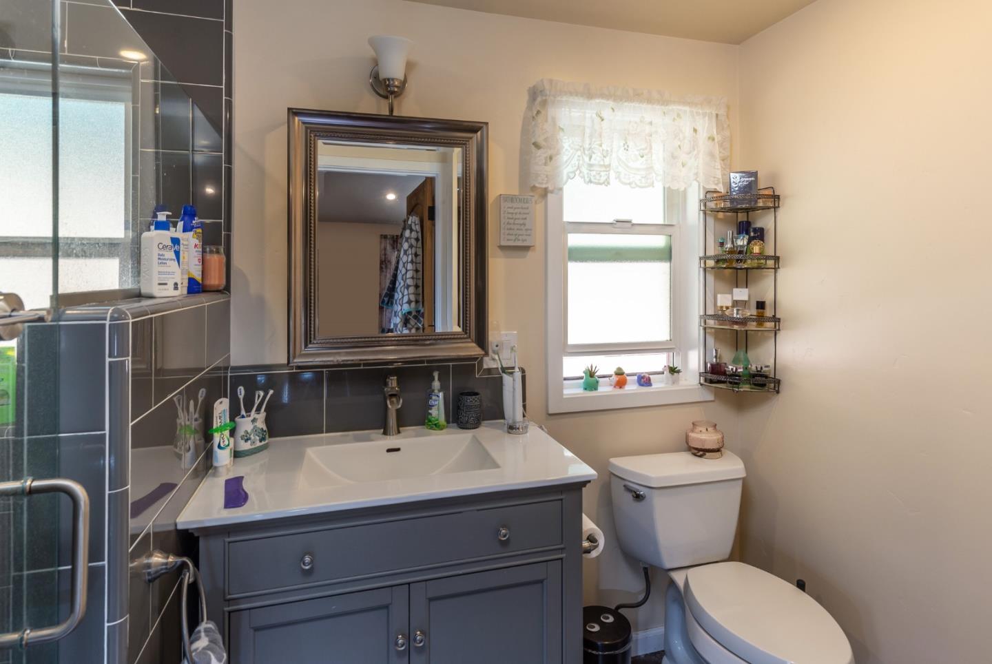 25255 Apple Hill Road Los Gatos, CA 95033 - Photo 39 of 47 a bathroom with a sink and a mirror
