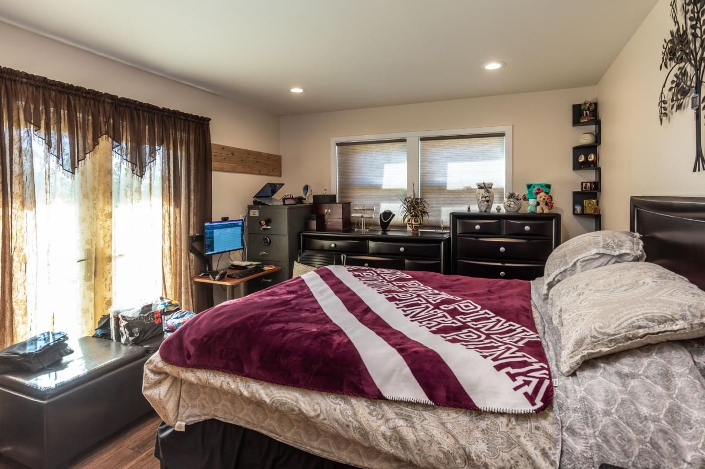 25255 Apple Hill Road Los Gatos, CA 95033 - Photo 40 of 47 a bedroom with a bed and wooden floor