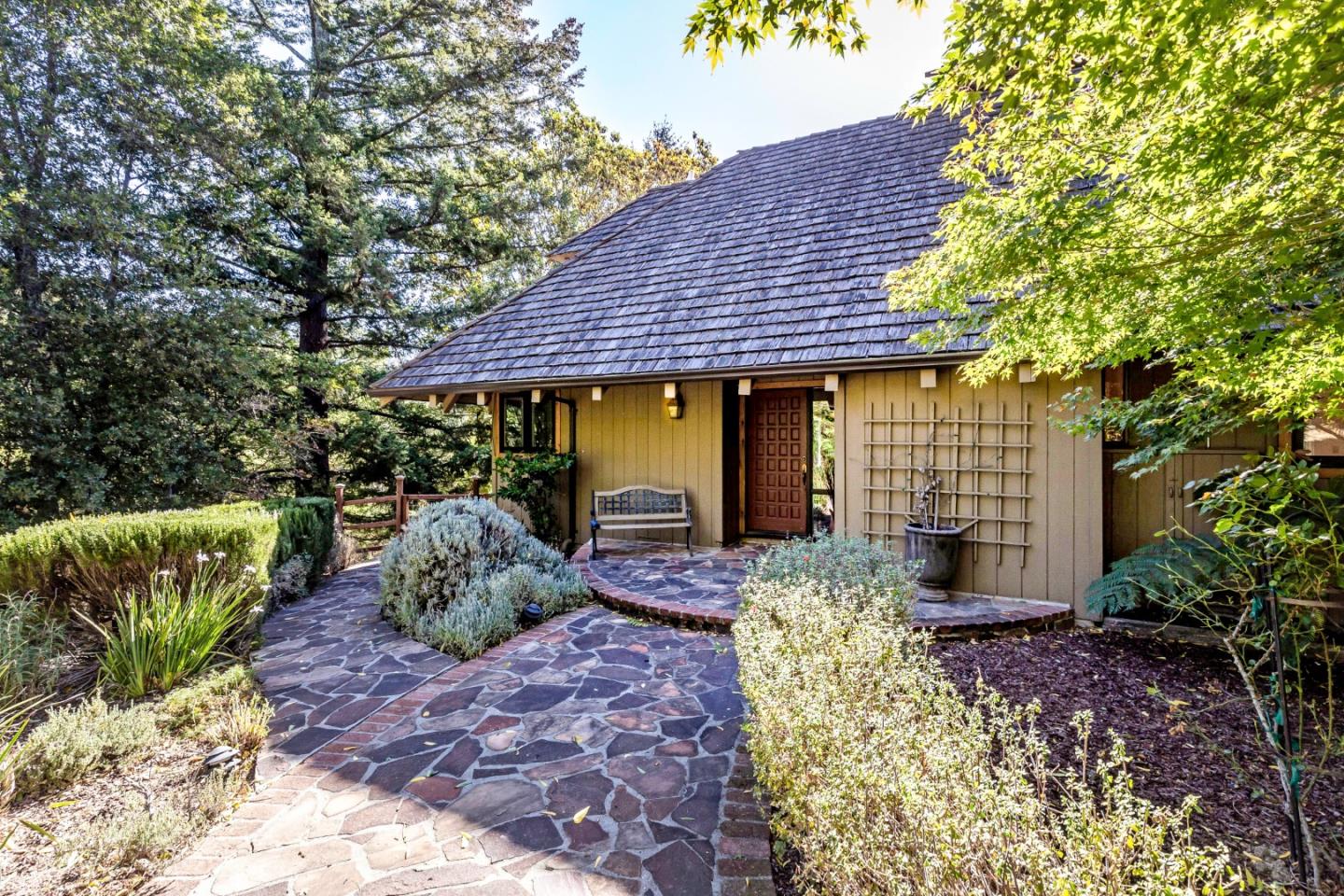 25255 Apple Hill Road Los Gatos, CA 95033 - Photo 5 of 47 a front view of a house with garden