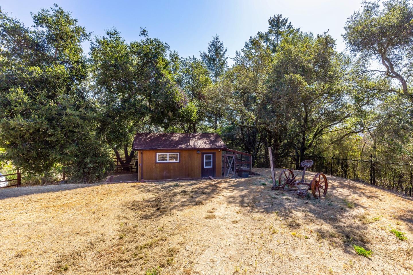 25255 Apple Hill Road Los Gatos, CA 95033 - Photo 44 of 47 a view of a blue house with a yard