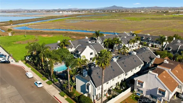a view of a city with an ocean view