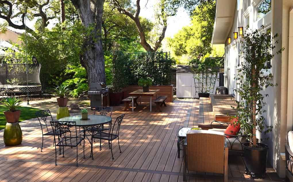 3538 Oak Drive Menlo Park, CA 94025 - Photo 15 of 20 a view of a patio with table and chairs potted plants and large tree