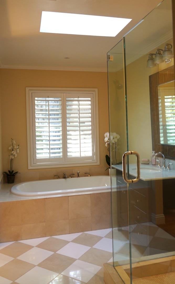 3538 Oak Drive Menlo Park, CA 94025 - Photo 8 of 20 a bathroom with a granite countertop sink and a bathtub