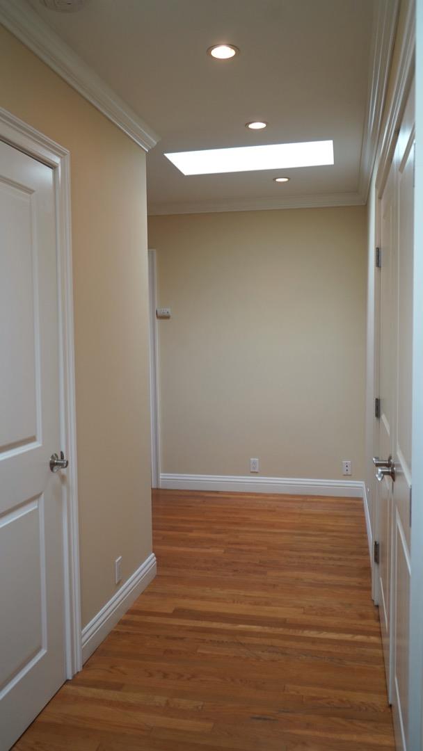 3538 Oak Drive Menlo Park, CA 94025 - Photo 9 of 20 a view of an empty room with wooden floor