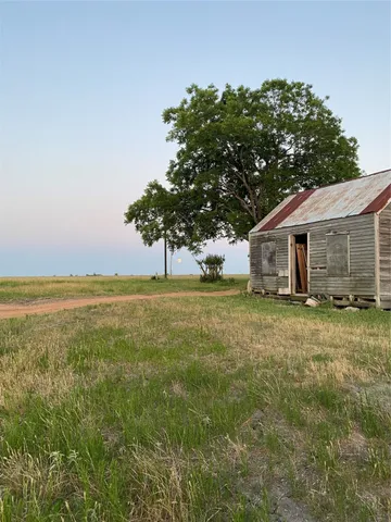 a house view with a garden space
