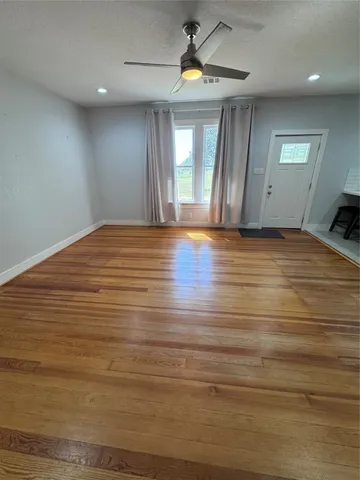 a view of a swimming pool with a yard