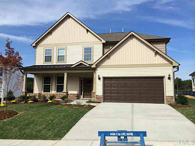 7517 Channery Way, Unit LT34 Raleigh, NC 27616 - Photo 1 of 25 a front view of a house with a yard