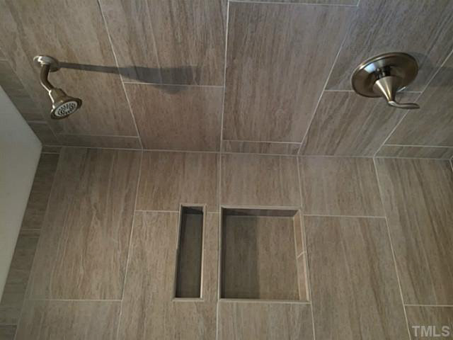 7517 Channery Way, Unit LT34 Raleigh, NC 27616 - Photo 24 of 25 a bathroom with a shower